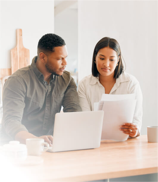 Two professionals collaborating at a desk